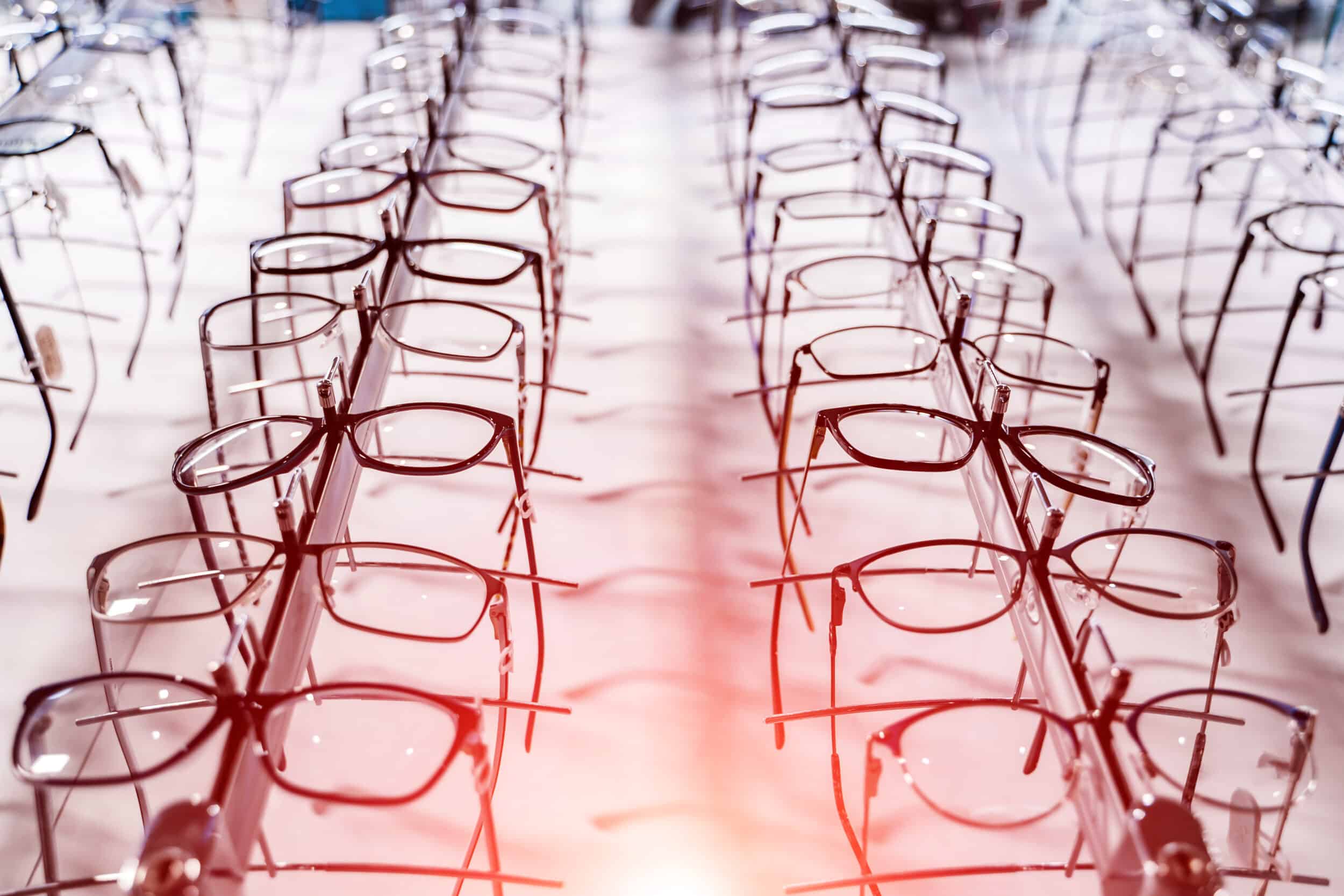 Eyeglasses with myopia diopter scale displayed on shelf in the department store.
